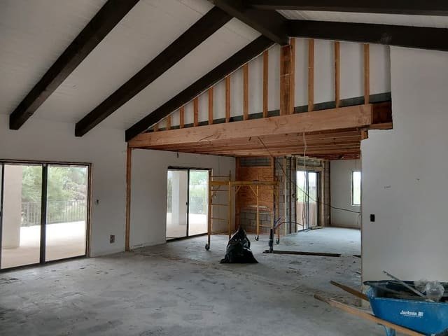 Interior remodel under vaulted beamed ceilings