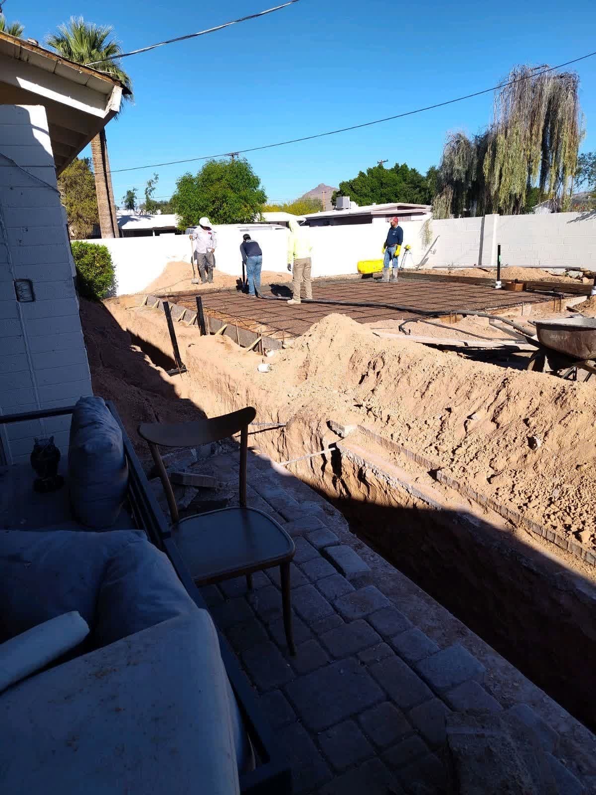 All American Builders crew placing a concrete slab for a detached ADU in the Valley